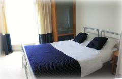 Second bedroom in a three bedroom apartment